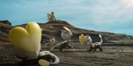 A group of Jangmo-o overseen by a Kommo-o (Image via Niantic)